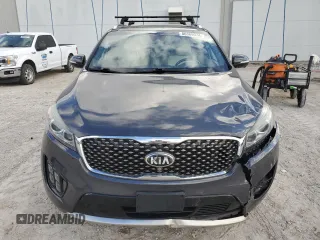 2016 Kia Sorento SX z VIN 5XYPKDA51GG099149, wystawiony jako Copart lot #86369074 z przebiegiem 173 923 mil mil oraz Szkoda całkowita • Salvage title. Historia ofert i sprzedaży dostępna na DreamBid. Obrazek 5.