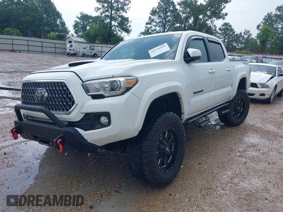 2019 Toyota Tacoma SR z VIN 3TMCZ5AN0KM232852, wystawiony jako IAAI lot #42178269 z przebiegiem 71 545 mil mil oraz . Historia ofert i sprzedaży dostępna na DreamBid. Obrazek 17.