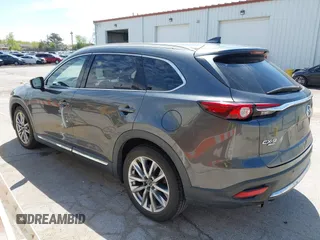 2016 Mazda CX-9 Signature with VIN JM3TCBEY2G0124433, listed as a IAAI auction lot 42194154 with 108,945 mi miles and . Bid and sale history available at DreamBid. Image 3.