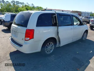 2018 Dodge Grand Caravan SXT with VIN 2C4RDGCG1JR326457, listed as a IAAI auction lot 42047301 with 84,518 mi miles and . Bid and sale history available at DreamBid. Image 4.