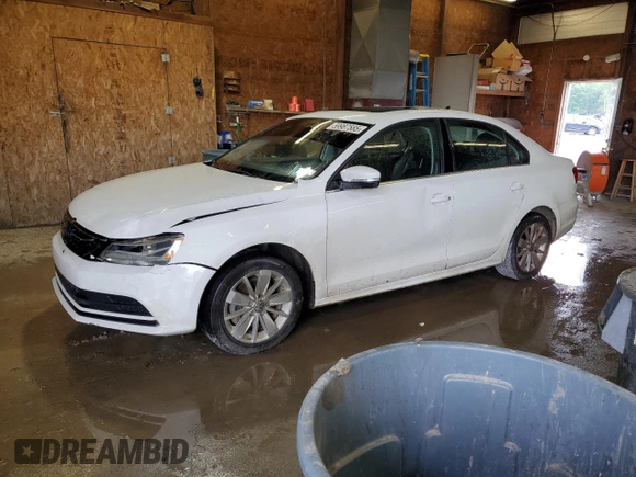 2015 Volkswagen Jetta SE with VIN 3VWD17AJ4FM308693, listed as a Copart auction lot 59987585 with 87,136 mi miles and Salvage title. Bid and sale history available at DreamBid. Image 1.