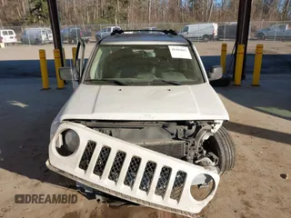 2015 Jeep Patriot Limited with VIN 1C4NJRCB9FD177233, listed as a IAAI auction lot 41443612 with 149,096 mi miles and . Bid and sale history available at DreamBid. Image 13.