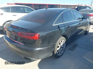 2016 Audi A6 2.0T Premium with VIN WAUCFAFC7GN048396, listed as a IAAI auction lot 41668956 with 169,312 mi miles. Bid and sale history available at carsss.com. Image 4.