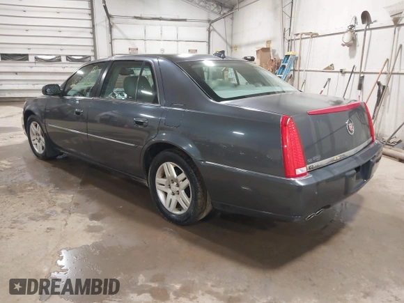 2010 Cadillac DTS w/1SC with VIN 1G6KD5EY7AU125289, listed as a IAAI auction lot 41836355 with 135,784 mi miles. Bid and sale history available at carsss.com. Image 3.