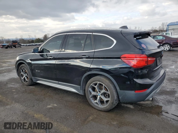 2016 BMW X1 xDrive28i with VIN WBXHT3C38G5E52301, listed as a Copart auction lot 88818445 with 91,221 mi miles and Salvage Title. Bid and sale history available at carsss.com. Image 2.