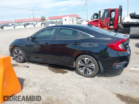 2016 Honda Civic Sedan EX-L with VIN 19XFC1F70GE011836, listed as a IAAI auction lot 41929383 with 186,497 mi miles. Bid and sale history available at carsss.com. Image 14.