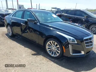 2014 Cadillac CTS Luxury AWD with VIN 1G6AX5S36E0197593, listed as a IAAI auction lot 42102435 with 109,873 mi miles and . Bid and sale history available at DreamBid. Image 1.