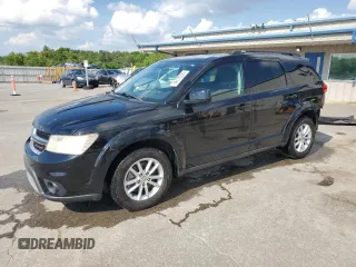 2014 Dodge Journey SXT with VIN 3C4PDCBG5ET126590, listed as a Copart auction lot 54770335 with 126,950 mi miles and Salvage Title. Bid and sale history available at DreamBid. Image 1.