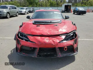 2021 Toyota Supra 3.0 z VIN WZ1DB0C09MW038550, wystawiony jako Copart lot #58066195 z przebiegiem Nie podano mil oraz Tytuł czysty. Historia ofert i sprzedaży dostępna na DreamBid. Obrazek 5.