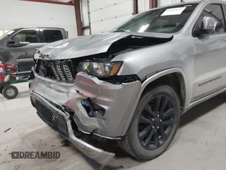 2018 Jeep Grand Cherokee Laredo E with VIN 1C4RJFAG6JC102969, listed as a IAAI auction lot 41963137 with 112,361 mi miles and . Bid and sale history available at DreamBid. Image 6.