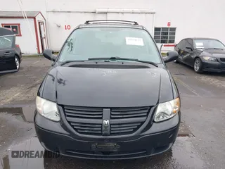 2007 Dodge Caravan SXT with VIN 1D4GP45R87B161237, listed as a IAAI auction lot 41594127 with 154,508 mi miles and . Bid and sale history available at DreamBid. Image 12.