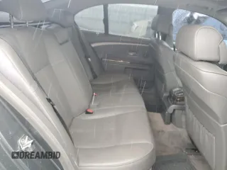2007 BMW 7 Series 750i z VIN WBAHL83587DT08789, wystawiony jako Copart lot #79364414 z przebiegiem 172 496 mil mil oraz Szkoda całkowita • Salvage title. Historia ofert i sprzedaży dostępna na DreamBid. Obrazek 10.
