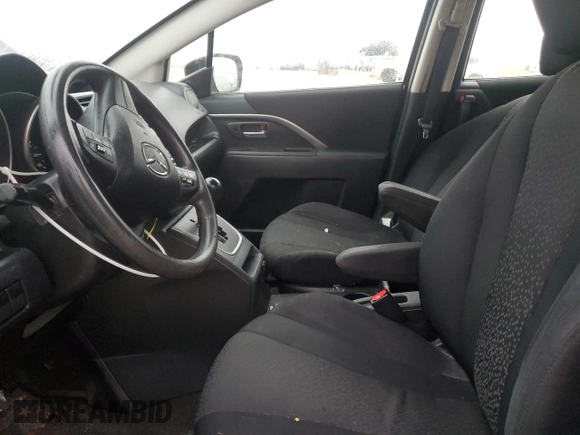 2012 Mazda 5 Sport z VIN JM1CW2BL0C0142657, wystawiony jako Copart lot #85156244 z przebiegiem 107 628 mil mil oraz Szkoda całkowita • Salvage title. Historia ofert i sprzedaży dostępna na DreamBid. Obrazek 7.