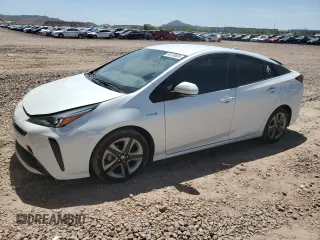 2021 Toyota Prius L Eco z VIN JTDKAMFU9M3132010, wystawiony jako Copart lot #56733635 z przebiegiem 65 654 mil mil oraz Szkoda całkowita • Salvage title. Historia ofert i sprzedaży dostępna na DreamBid. Obrazek 1.