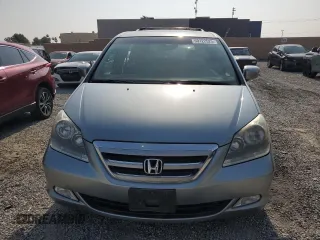 2006 Honda Odyssey EX-L z VIN 5FNRL38756B087695, wystawiony jako Copart lot #60122525 z przebiegiem 213 221 mil mil oraz Szkoda całkowita • Salvage title. Historia ofert i sprzedaży dostępna na DreamBid. Obrazek 5.