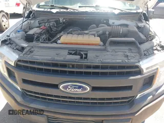 2018 Ford F-150 XL with VIN 1FTMF1CB1JKC58164, listed as a IAAI auction lot 42289514 with 57,075 mi miles and . Bid and sale history available at DreamBid. Image 10.