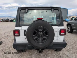 2023 Jeep Wrangler Sport S with VIN 1C4HJXDN5PW678653, listed as a Copart auction lot 57464705 with 22,154 mi miles and Salvage title. Bid and sale history available at DreamBid. Image 6.