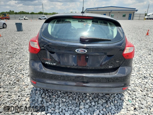 2012 Ford Focus SE z VIN 1FAHP3K25CL248672, wystawiony jako Copart lot #58129345 z przebiegiem 124 687 mil mil oraz Szkoda całkowita • Salvage title. Historia ofert i sprzedaży dostępna na DreamBid. Obrazek 6.