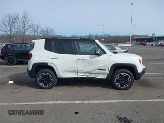 2015 Jeep Renegade Trailhawk with VIN ZACCJBCT6FPB32422, listed as a IAAI auction lot 41618410 with 42,219 mi miles and . Bid and sale history available at DreamBid. Image 13.