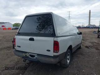 2003 Ford F-150 XL with VIN 1FTRF17L23NB95487, listed as a IAAI auction lot 42154868 with 187,000 mi miles and . Bid and sale history available at DreamBid. Image 4.