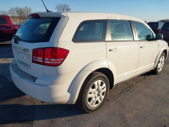 2014 Dodge Journey SE with VIN 3C4PDCAB7ET115807, listed as a IAAI auction lot 41365976 with 91,614 mi miles. Bid and sale history available at carsss.com. Image 4.