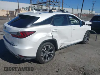 2022 Lexus RX with VIN 2T2HZMAA1NC232512, listed as a IAAI auction lot 41375711 with 27,599 mi miles. Bid and sale history available at carsss.com. Image 4.