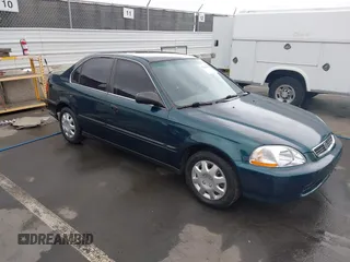 1997 Honda Civic LX z VIN 2HGEJ6670VH540804, wystawiony jako IAAI lot #42211373 z przebiegiem 142 063 mil mil oraz . Historia ofert i sprzedaży dostępna na DreamBid. Obrazek 1.