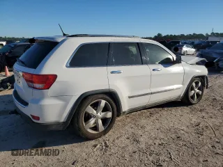 2013 Jeep Grand Cherokee Overland with VIN 1C4RJFCG8DC606862, listed as a Copart auction lot 82149804 with 155,999 mi miles and Salvage Title. Bid and sale history available at carsss.com. Image 3.