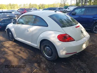 2012 Volkswagen Beetle 2.5L w/Sound/Nav PZEV with VIN 3VWJP7AT1CM619318, listed as a IAAI auction lot 42223291 with 85,989 mi miles and . Bid and sale history available at DreamBid. Image 3.