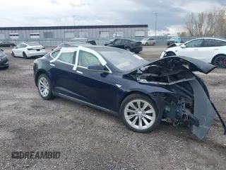 2015 Tesla Model S 85D with VIN 5YJSA1H23FFP79020, listed as a IAAI auction lot 41819392 with Not Provided miles. Bid and sale history available at carsss.com. Image 1.