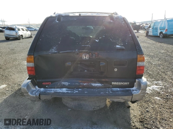 2001 Honda Passport LX z VIN 4S6DM58W014404165, wystawiony jako Copart lot #81636614 z przebiegiem 157 744 mil mil oraz Czysty tytuł • Clean title. Historia ofert i sprzedaży dostępna na DreamBid. Obrazek 6.