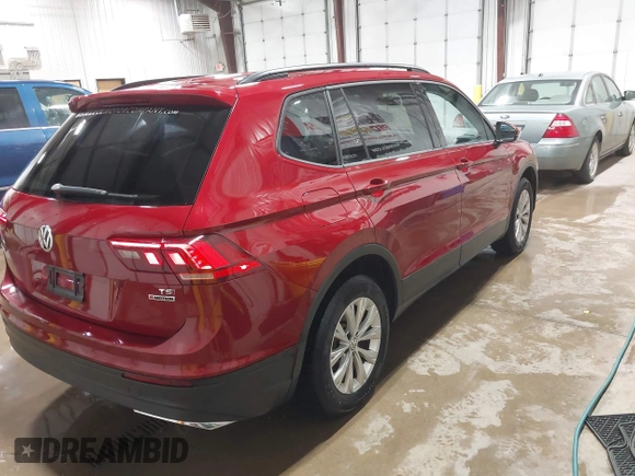 2018 Volkswagen Tiguan S with VIN 3VV0B7AX5JM104191, listed as a IAAI auction lot 42492503 with 96,339 mi miles and . Bid and sale history available at DreamBid. Image 4.