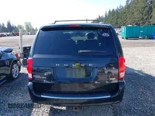 2012 Dodge Grand Caravan SXT with VIN 2C4RDGCG2CR319651, listed as a IAAI auction lot 42097594 with 155,521 mi miles and . Bid and sale history available at DreamBid. Image 16.