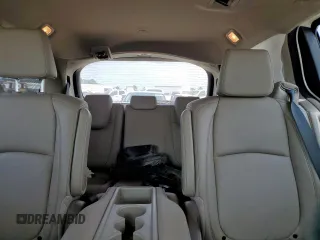 2023 Honda Odyssey Touring с VIN 5FNRL6H8XPB001311, выставлен на аукционе Copart как лот 56924345 с пробегом 77 736 миль миль и Списание • Salvage title. История ставок и продаж доступна на DreamBid. Изображение 10.