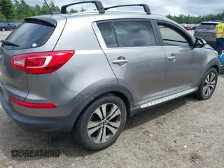 2013 Kia Sportage EX with VIN KNDPCCA26D7428000, listed as a IAAI auction lot 42684573 with 155,722 mi miles and . Bid and sale history available at DreamBid. Image 4.