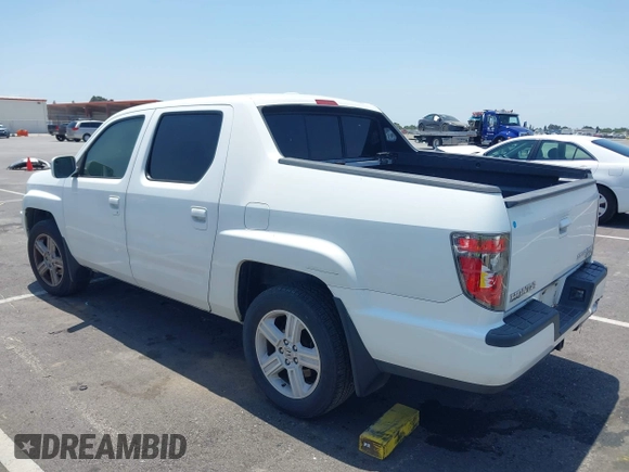 2013 Honda Ridgeline RTL with VIN 5FPYK1F50DB013612, listed as a IAAI auction lot 42430119 with 190,913 mi miles and . Bid and sale history available at DreamBid. Image 3.