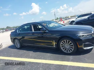 2022 BMW 7 Series 740i with VIN WBA7T2C02NCH73426, listed as a IAAI auction lot 42641007 with 49,300 mi miles and . Bid and sale history available at DreamBid. Image 14.