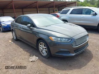 2016 Ford Fusion SE with VIN 3FA6P0H7XGR319039, listed as a IAAI auction lot 42051350 with 107,301 mi miles. Bid and sale history available at carsss.com. Image 1.