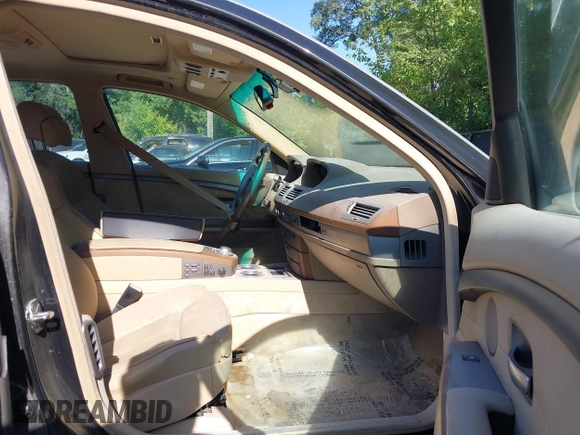 2004 BMW 7 Series 745Li with VIN WBAGN63594DS54487, listed as a IAAI auction lot 42497386 with 125,813 mi miles and . Bid and sale history available at DreamBid. Image 5.