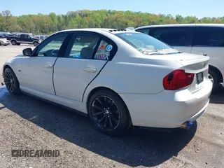 2011 BMW 3 Series 328i with VIN WBAPH7G51BNM55914, listed as a IAAI auction lot 41948442 with 130,732 mi miles. Bid and sale history available at carsss.com. Image 3.