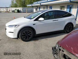 2022 Tesla Model X with VIN 7SAXCDE51NF342652, listed as a Copart auction lot 42756105 with Not Provided miles and Salvage Title. Bid and sale history available at DreamBid. Image 1.