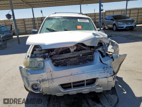 2005 Ford Escape Hybrid z VIN 1FMCU96H75KB95718, wystawiony jako Copart lot #60000825 z przebiegiem Nie podano mil oraz Czysty tytuł • Clean title. Historia ofert i sprzedaży dostępna na DreamBid. Obrazek 5.