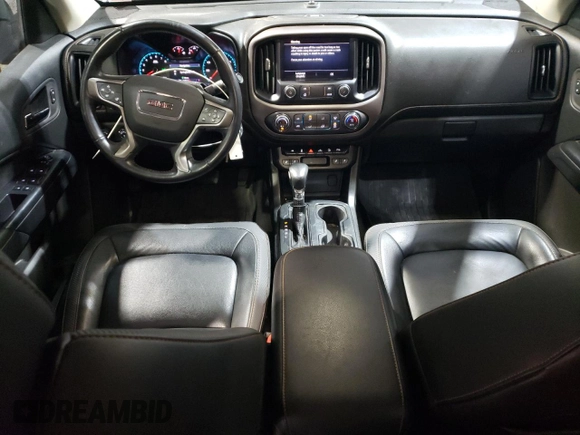 2022 GMC Canyon 4WD AT4 w/Leather with VIN 1GTG6FEN1N1175900, listed as a Copart auction lot 85957514 with 56,811 mi miles and Salvage Title. Bid and sale history available at carsss.com. Image 8.