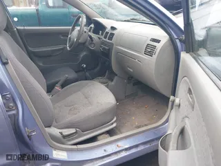 2003 Kia Rio with VIN KNADC125736227286, listed as a IAAI auction lot 41928174 with 151,431 mi miles. Bid and sale history available at carsss.com. Image 5.