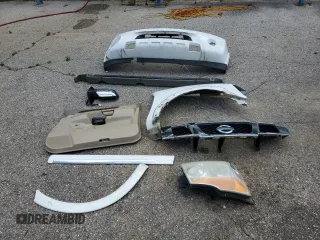2011 Nissan Armada SV z VIN 5N1BA0ND7BN611338, wystawiony jako Copart lot #57069135 z przebiegiem 183 444 mil mil oraz Szkoda całkowita • Salvage title. Historia ofert i sprzedaży dostępna na DreamBid. Obrazek 13.