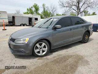 2012 Volkswagen Jetta TDI w/Premium & Nav z VIN 3VWLL7AJ8CM319746, wystawiony jako Copart lot #54313335 z przebiegiem 186 003 mil mil oraz Czysty tytuł • Clean title. Historia ofert i sprzedaży dostępna na DreamBid. Obrazek 1.