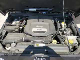 2016 Jeep Wrangler Unlimited Rubicon with VIN 1C4BJWFG5GL290757, listed as a Copart auction lot 52099225 with 102,424 mi miles and Salvage title. Bid and sale history available at DreamBid. Image 12.