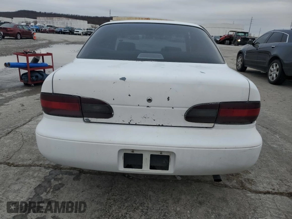 1996 Geo Prizm z VIN 1Y1SK5263TZ061291, wystawiony jako Copart lot #85366554 z przebiegiem 211 051 mil mil oraz Szkody całkowita. Historia ofert i sprzedaży dostępna na DreamBid. Obrazek 6.