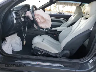 2018 BMW M4 with VIN WBS4Z9C50JEA24236, listed as a Copart auction lot 84741504 with Not provided miles and Salvage title. Bid and sale history available at DreamBid. Image 7.