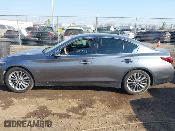2019 Infiniti Q50 3.0t LUXE with VIN JN1EV7AP7KM513059, listed as a IAAI auction lot 41737122 with 77,337 mi miles. Bid and sale history available at carsss.com. Image 14.